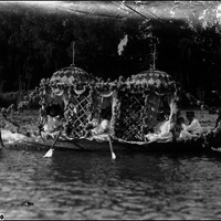 Image: row boat decorated with flowers 