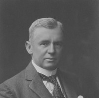 Image: portrait of man wearing tie and suit jacket