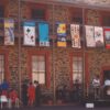 Image: building displaying banners from first floor balcony