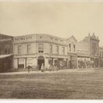 Image: Corner store with posing lady