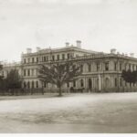 Image: 1880s photograph of ornate building, with horse and cart