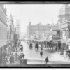 Image: Busy street scene with advertising on arcade dome