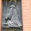 grey concrete relief of Saint Casimir