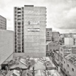 Image: black and white shot of Synagogue Place, with faded Gerard and Goodman sign visible on right