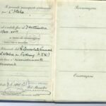 Image: open passport showing handwritten details