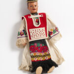 Image: male doll in colourful costume