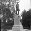 Image: sculpture of standing man in nineteenth century costume