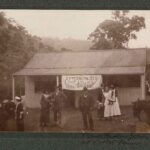 Image: group of people standing in front of building