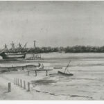 Image: A watercolour sketch of a riverbank with largely rural surroundings. The corner of a single-storey, early-nineteenth century building is visible at image left. A large three-masted sailing vessel is grounded in the middle distance