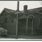 Bluestone cottage with terracotta tiled roof, corner of Grote Street and Ruthven Avenue