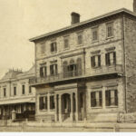 Image: view of three buildings from the street