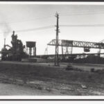 Image: Building next to large steel machinery