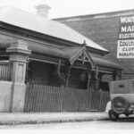 Image: Car parked in front of buildings