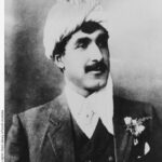 Image: a man wearing a white turban