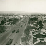 Image: view of cityscape with trams and garden squares in foreground