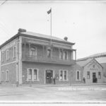 Image: Two storey stone building with words Missions to Seamen painted on side wall