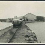 Image: carts on a rail in front of shed