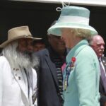 Image: man and woman shaking hands