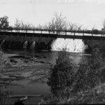 Image: View of river water fall under bridge