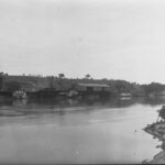 Image: view of building from opposite river bank