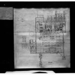 Old, detailed ink on paper plan for a power station.