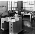 Image: woman in nursing uniform working