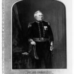 Image: A full-length portrait of a middle-aged man in naval officer's dress uniform