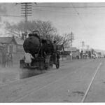 Image: Black and white photo of a Mann tar-sprayer on Unley Road, twentieth century.