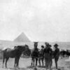 Image: Horses being shod in Egypt, a pyramid can be seen in the background