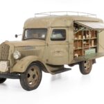 Image: khaki coloured van packed with goods