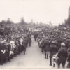 Image: People lining the street as the funeral procession passes by