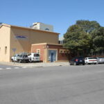 Image: Two storey building on street corner