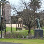 Image: A bronze statue of a cricket batsman standing in a ‘driving’ pose