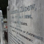 Image: engraved grey stone grave headstone