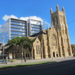 Image: Street with sandstone church building