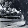 Image: wooden boat with canopy on river