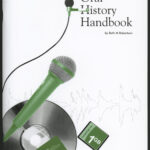 Image: the cover of the Oral History Handbook depicting a microphone and CD