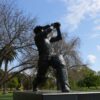 Image: Bronze statue of man with cricket bat