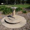 Image: Brown sun dial in parklands