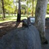 Image:  boulders with sculpture and plaques mounted on them