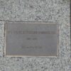 Bronze plaque set in pavement, inscribed with information about Dr Charles George Everard