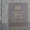 Bronze plaque set in pavement inscribed with name and City of Adelaide logo