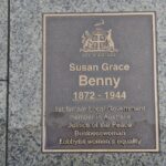 Bronze plaque set in pavement inscribed with name and City of Adelaide logo