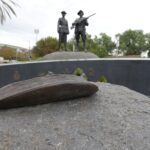 Image: bronze sculpture of curved wooden vessel