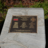 Image: 7th Australian infantry memorial with insignia and inscription