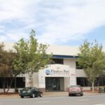 Large concrete and glass building with sign, Flinders Ports