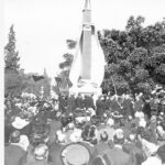 Image: Crowd watching unveiling of monument