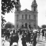 Image: a crowd of people standing outside a church