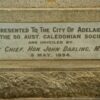 Unveiling plaque on Robert Burns statue