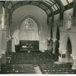 Image: Inside the Stow Memorial Church. The image shows an altar, pews and the English Gothic architectural elements of the building.